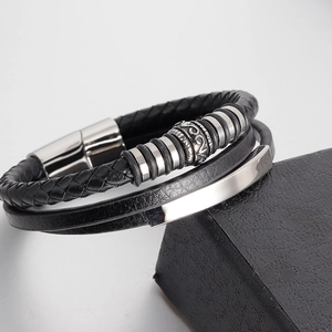 Men's multilayer black leather bracelet with braided cords and polished magnetic clasp