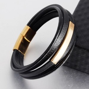 Men's multilayer black braided leather bracelet with a polished gold magnetic clasp