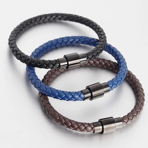 Three-piece braided leather bracelets for men with magnetic metal clasps in black, blue, and brown