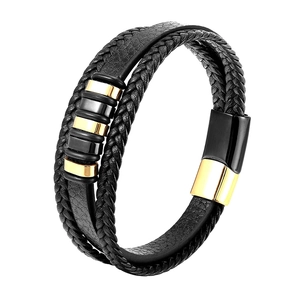 Close-up of multilayer leather bracelet with golden rings and magnetic clasp