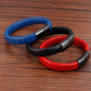 Detail of braided leather bracelets in blue, black, and red with magnetic metal clasps