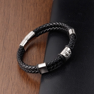 Men's black braided leather bracelet with stainless steel cross charm and magnetic clasp