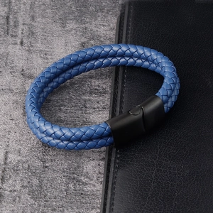 Close-up of blue double-braid leather bracelet with black matte magnetic metal clasp