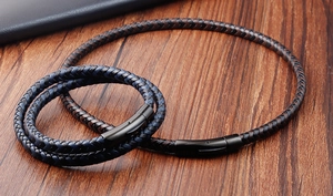 Detail of double-layer braided leather bracelets with matte black magnetic steel clasps