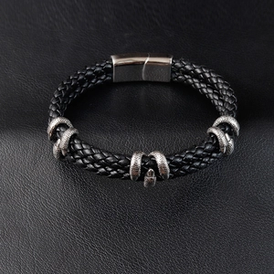 Bracelet pour hommes en cuir tressé avec breloques griffes de dragon et fermoir magnétique