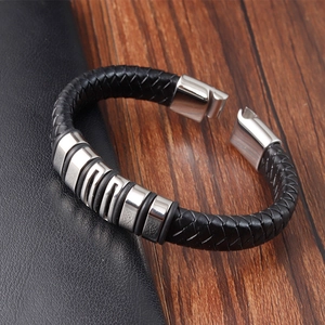 Men's woven leather bracelet with stainless steel magnetic clasp and pattern charm