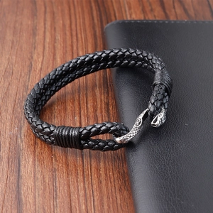 Bracelet tressé en cuir noir pour hommes avec fermoir serpent en acier inoxydable