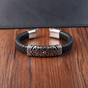 Handmade black braided leather bracelet for men with vintage engraved metal plaque