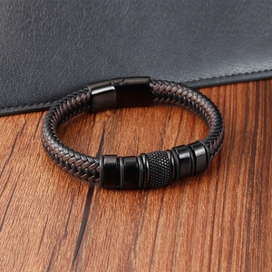 Handmade woven leather bracelet for men with vintage black magnetic clasp and metal rings