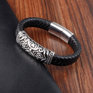 Hand-woven leather bracelet for men with retro scroll patterns and magnetic steel clasp
