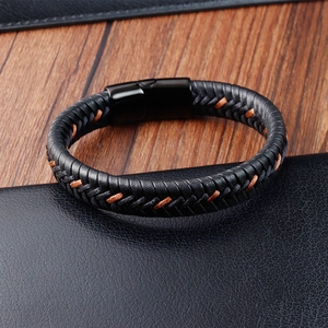 Minimalist men's black braided leather bracelet with magnetic buckle and brown stitching