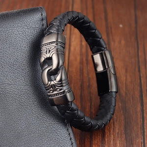 Men's black woven leather bracelet with vintage totem engraved dark gunmetal clasp