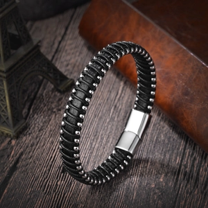 Minimalist men's braided black leather bracelet with silver beads and magnetic clasp