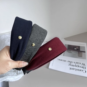 Three-piece set of minimalist ribbed knit wide headbands with gold metal accents