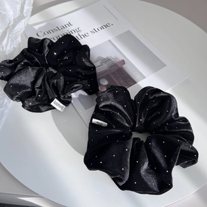 Elegant set of two black velvet scrunchies with white bead accents and handmade label