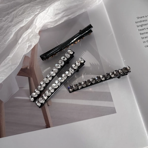 Chic black hair clip set with sparkling Czech crystals for minimalist side hair styling