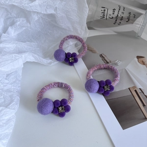 Lot de 3 chouchous violets charmants avec détails en tricot et fleurs en velours