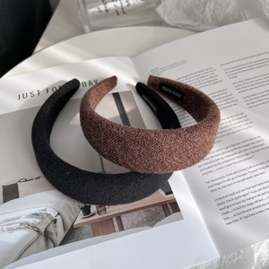 Elegant wide wool tweed headband set in black and caramel brown colors with handmade tag