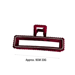Elegant deep red velvet hair claw clip with white rhinestones and metal alloy base