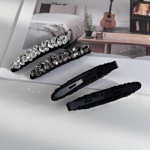 Set di fermagli per capelli con strass scintillanti e rivestimento in tessuto nero