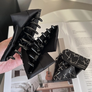 Elegant black satin bow hair claw clip with sparkling rhinestones for women