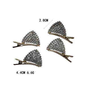 Ensemble de barrettes dorées avec strass brillants et design oreilles de lapin