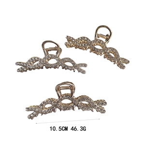 Elegante gouden metalen haarklem met strass steentjes voor luxe kapsels