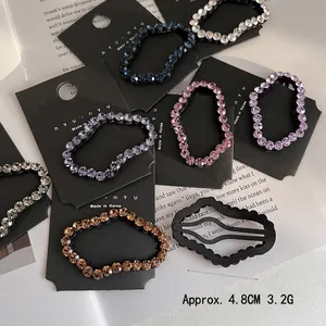 Set of sparkling cloud rhinestone hair clips for women in multi-color metal finishes