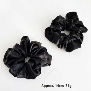 Set of two black satin scrunchies with rhinestones, 14cm wide and weighing 31g