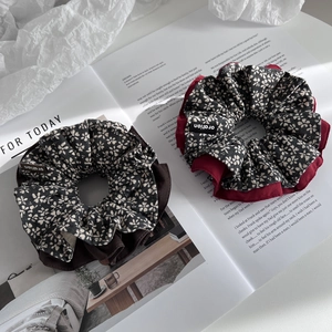 Floral print fabric scrunchies in dark coffee and deep red colors for elegant hairstyles