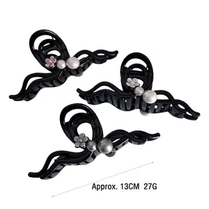 Three-piece elegant camellia pearl hair claws for buns, black finish, 13cm length