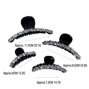 Set di quattro mollette per capelli nere con strass scintillanti in varie dimensioni