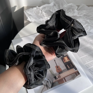 Elegant black satin scrunchie set with sparkling silver rhinestones for women