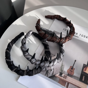 Punk style satin headband set with rhinestones and black cone studs for high skull top