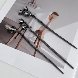 Three-piece set of gunmetal floral hair sticks with elegant imitation pearls and branch texture