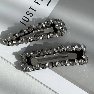 Elegant pair of sparkling rhinestone BB hair clips in teardrop and rectangular shapes