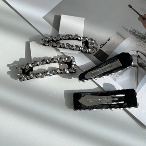 Sparkling rhinestone hair clip set with rectangle and teardrop shapes in premium black finish