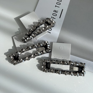 Three-piece set of luxury black hair clips with sparkling grey rhinestones for women