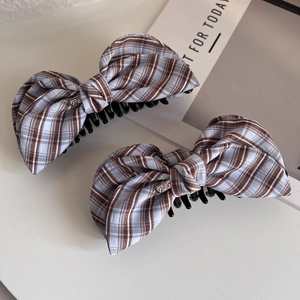 Elegant plaid bow hair clips in light blue and brown fabric with silver metal tags