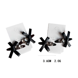Mini black leather bow hair clip with rhinestones and metal duckbill clip for women