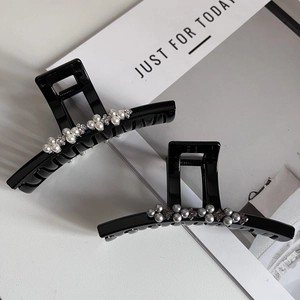 Minimalistisches Haarklammer-Set mit Perlen und Strasssteinen in Schwarz für elegante Damen