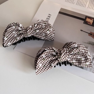Plaid bow hair clips with white floral embroidery and black plastic banana base