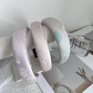Three Chinese embroidery satin headbands in pastel colors with floral patterns