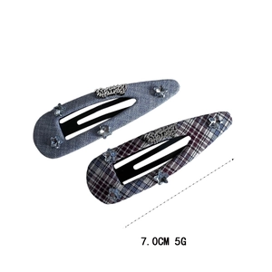 Blue plaid hair clips set with star rhinestones and metal letters on white background