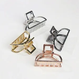 Lot de 4 pinces à cheveux métalliques en finitions or, argent, noir et or rose