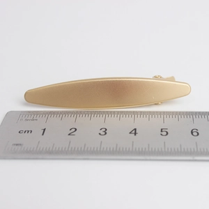 Matte gold alloy duckbill hair clip for women featuring 6.5cm length measurement