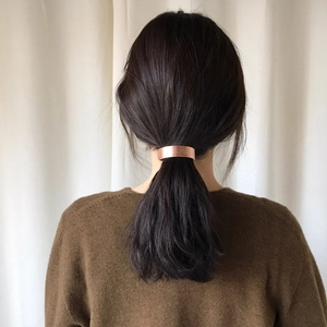 Minimalist brushed rose gold metal hair cuff clip for elegant ponytail styling