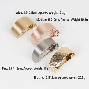 Set of minimalist metal hair clips in gold and silver finishes for women's hairstyles