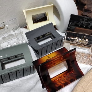 Minimalist square hollow hair claw clips set in various colors with a glossy finish