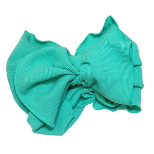 Fascia per capelli in maglia a coste verde acqua con grande fiocco a strati